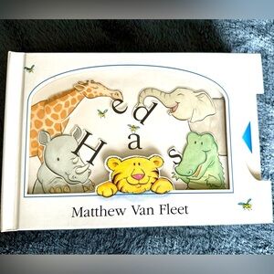 Mathew Van Fleet book with moving parts in fair used condition, has ripped pages